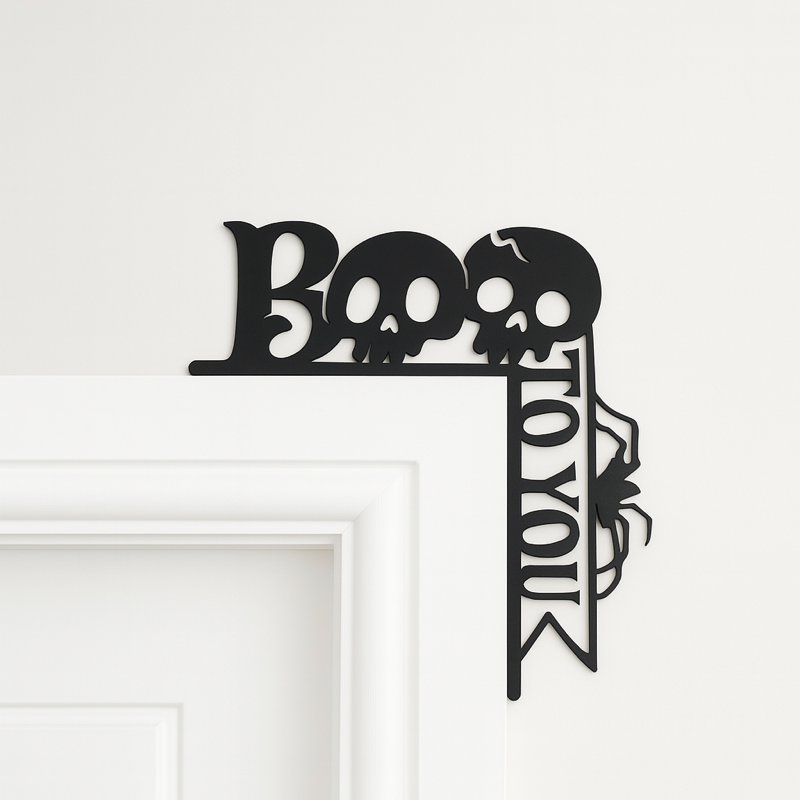 Black MDF Halloween door decoration with BOO text, skull and spider design – spooky gothic wall art for Halloween parties or décor.