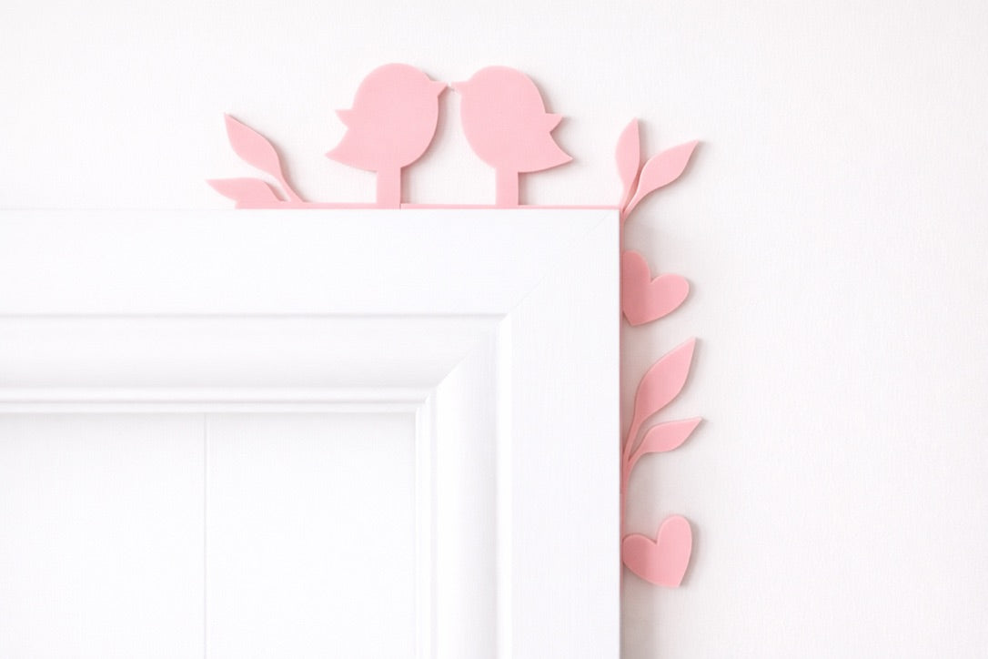 Personalised bird door topper featuring two birds, displayed on a door frame as a romantic couple home decor gift.
