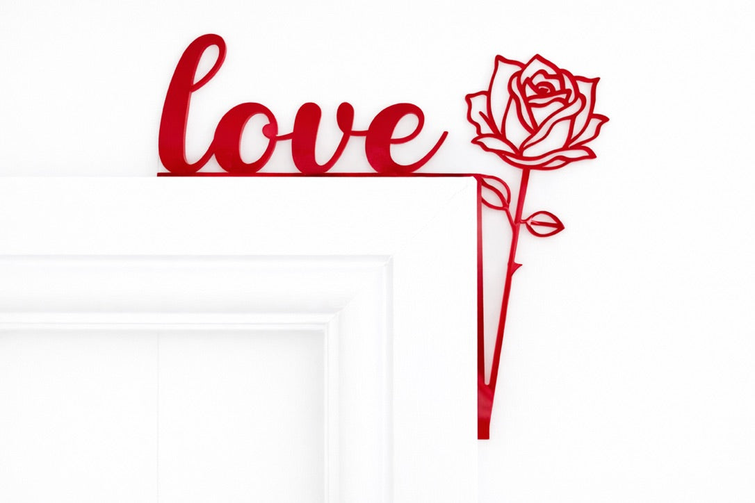 Love and rose door corner decoration made from acrylic, displayed on a door frame as romantic home decor.
