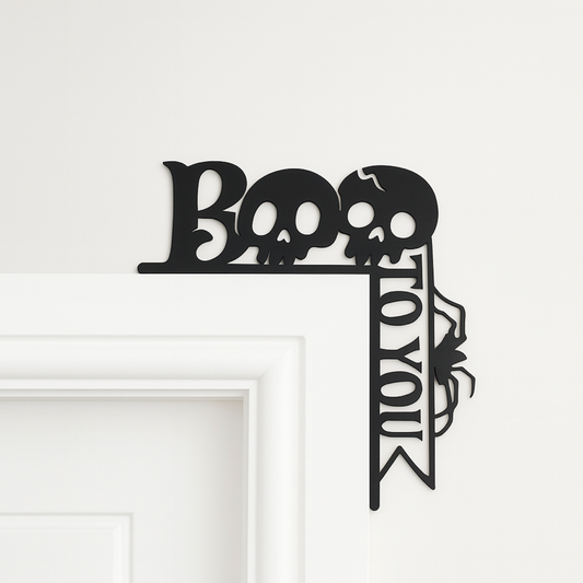 Black MDF Halloween door decoration with BOO text, skull and spider design – spooky gothic wall art for Halloween parties or décor.
