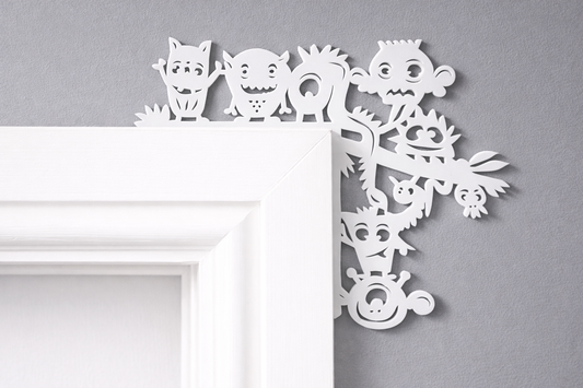 Monster door corner decoration made from acrylic, displayed on a door frame in a child’s bedroom or playroom.
