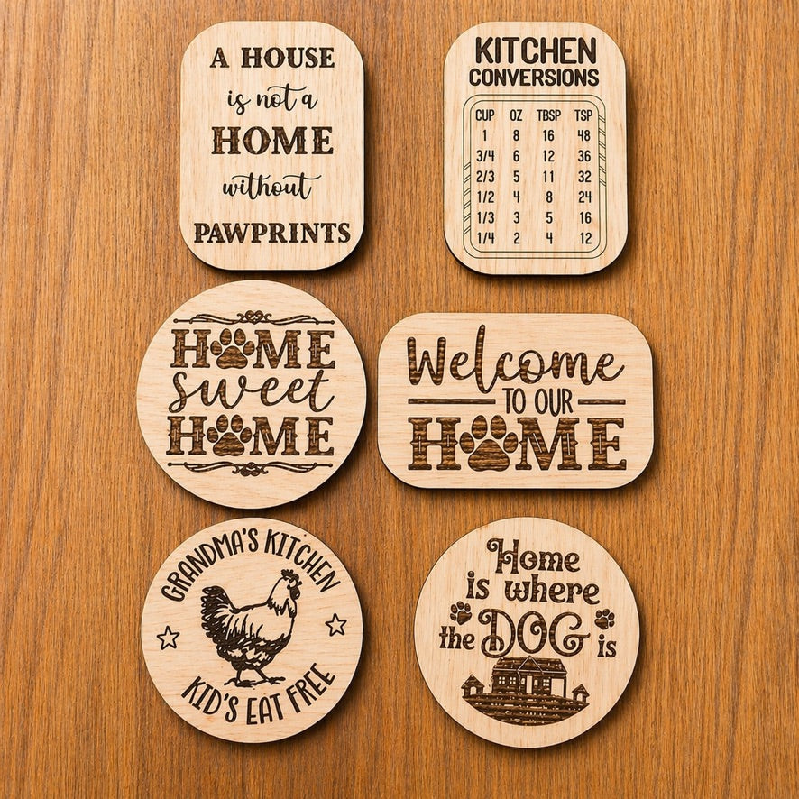 Set of wooden coasters with various sayings on a wooden surface