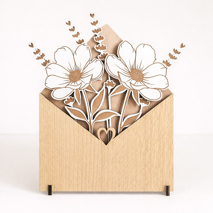Wooden envelope with floral design on a white background